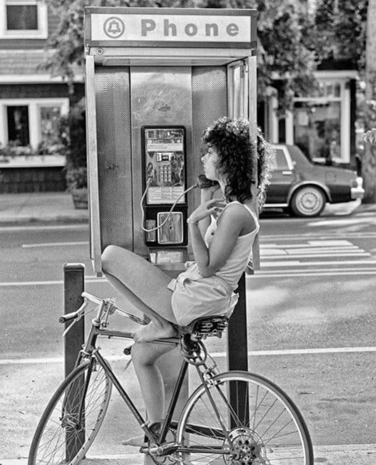 diane on the payphone city island - Phone